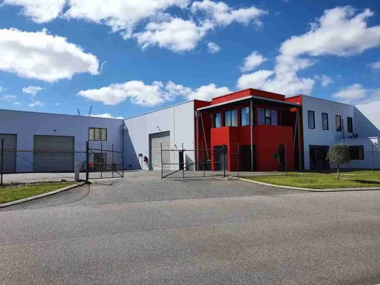 Modern blue and red commercial office and warehouse building
