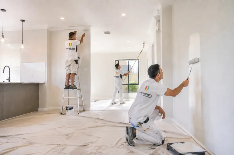Professional house painters in Canning Vale painting interior walls and ceiling of a residential home