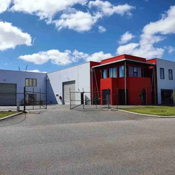 Modern blue and red commercial office and warehouse building